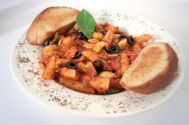 Creamy pasta dish served at a cafe franchise in India-offering dessert business franchise.