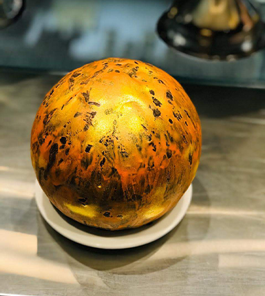 Unique bomb cake available at a chocolate shop franchise in India, offering exciting dessert business opportunities.