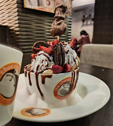 Chocolate cup dessert available at a chocolate shop franchise in India.