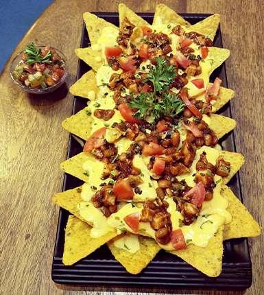 Affordable cafe franchise in India offering nachos and dessert business franchising opportunities.
